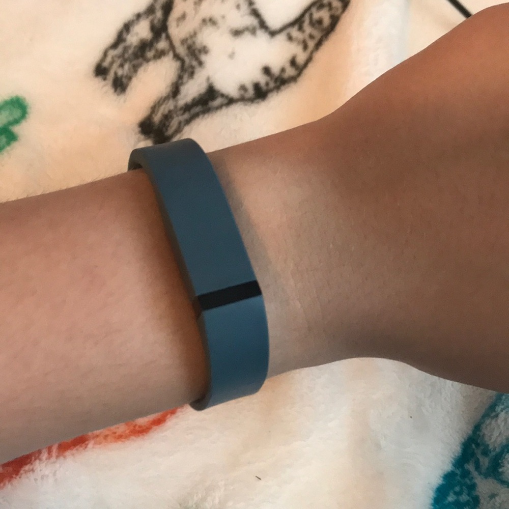 Two blue FitBits